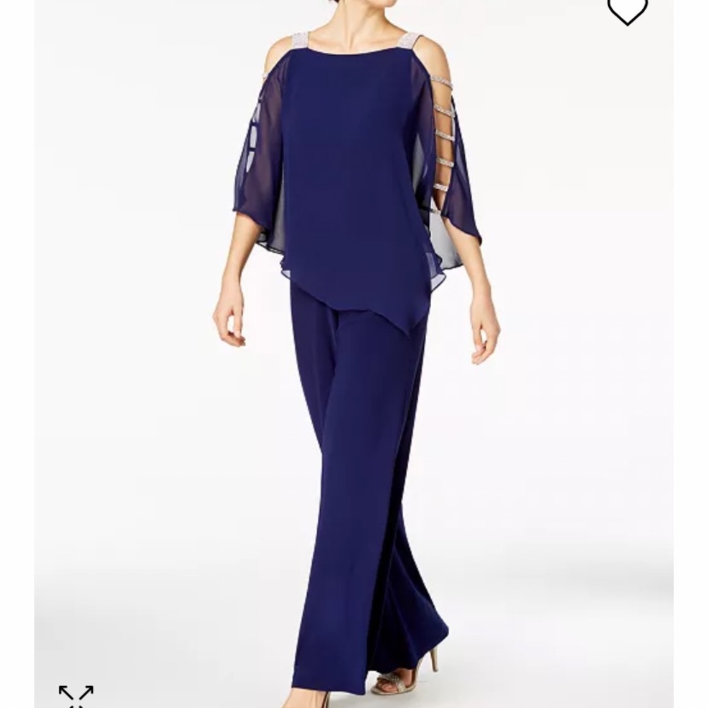 Gorgeous jumpsuit w rhinestone detailing..stunning super comfortable..worn once